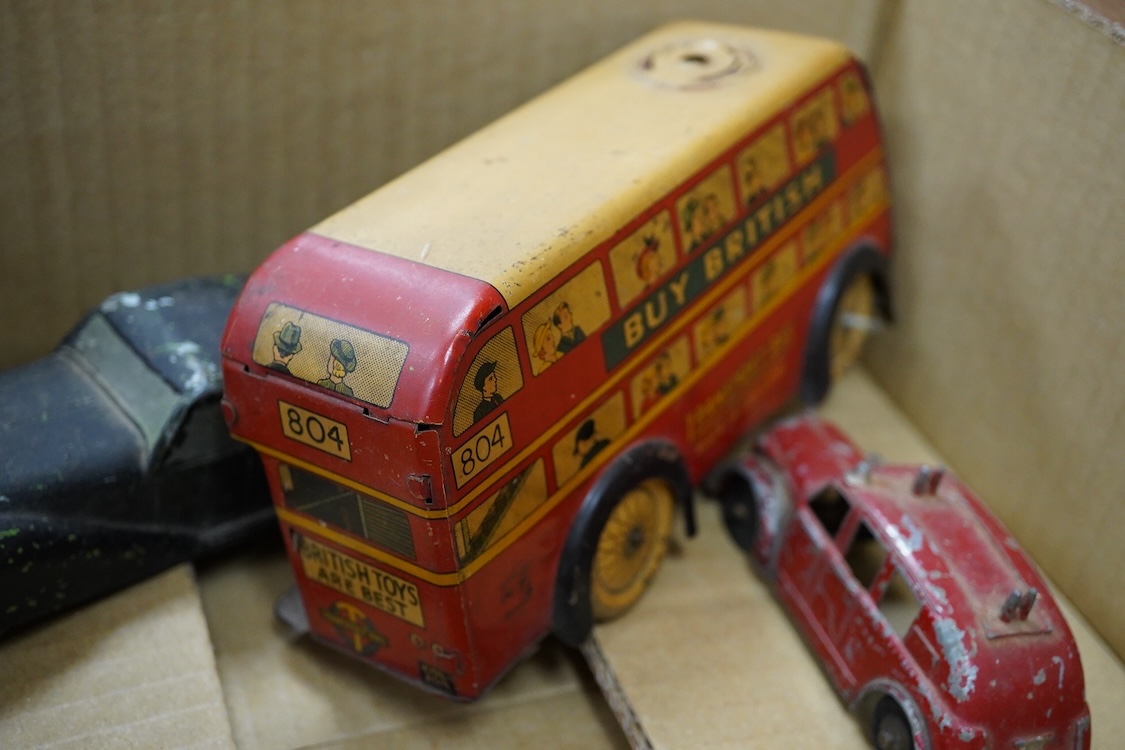Five tinplate and diecast toys; a Wells Brimtoy tinplate London transport trolley bus, a tinplate RAF fighter aircraft possibly by Mettoy, two TTi (TT Industries) diecast Allard saloon cars, and an Arber Products diecast